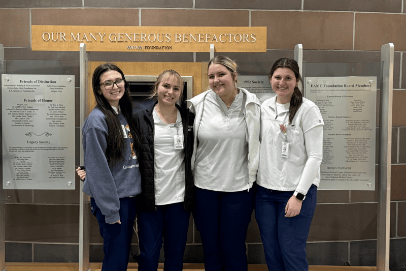 Students posing for a photo at East Alabama Medical Center.