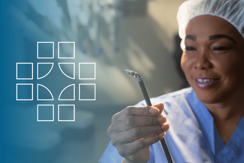 A doctor holding surgical equipment
