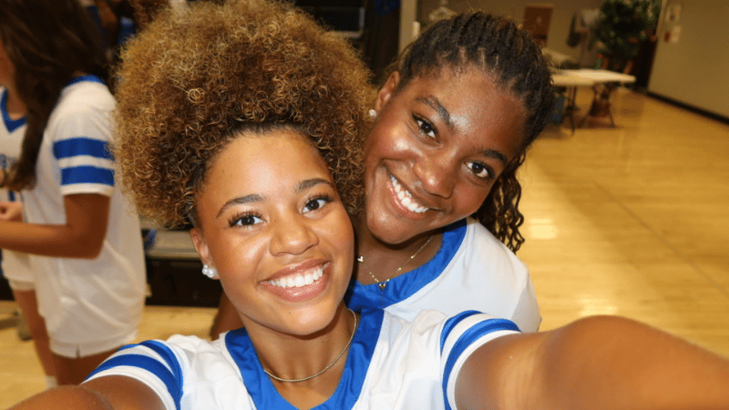 Auburn High School flag football players Olivia Pearl Simmons and Alyssa Kate Jackson.