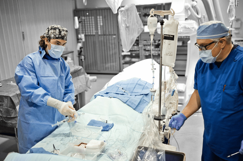 Two heart surgeons at EAMC prepare to perform a procedure