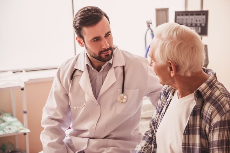 Doctor speaking with male patient.